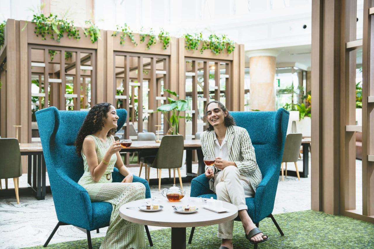 Oriental Hotel Okinawa Resort & Spa Nago Exterior foto The Lounge at the airport