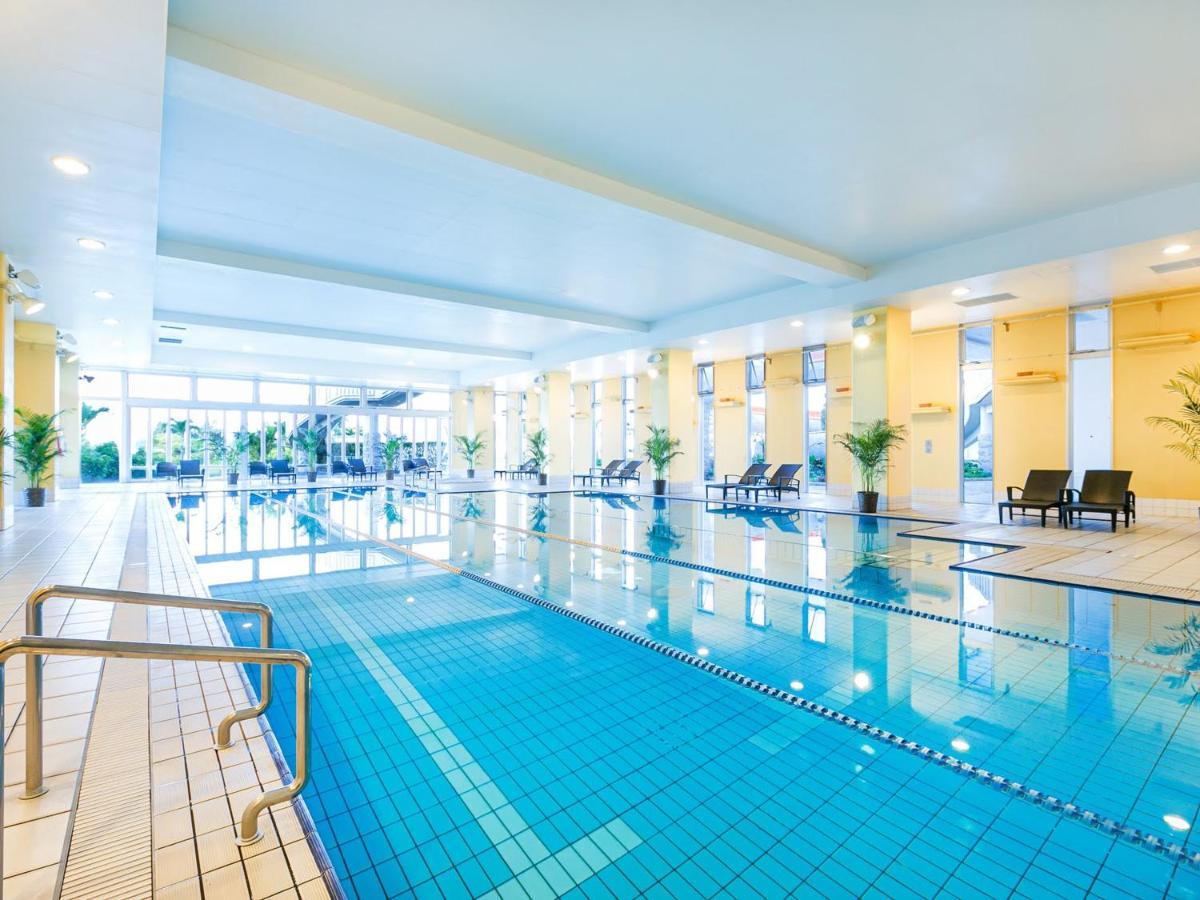 Oriental Hotel Okinawa Resort & Spa Nago Exterior foto Indoor pool